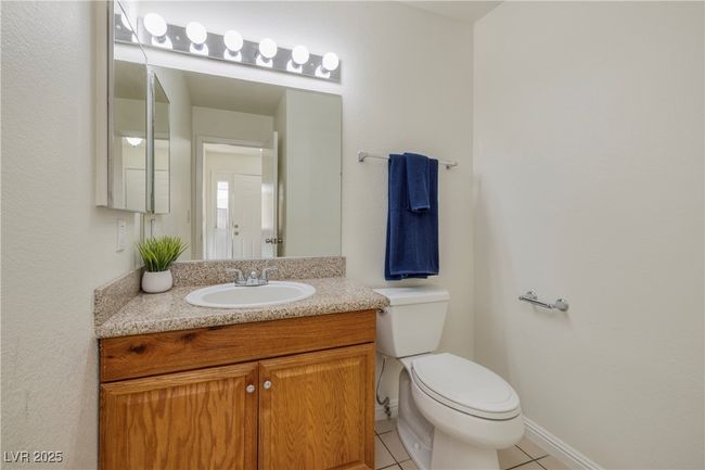 Bathroom featuring tile patterned floors and vanity | Image 20