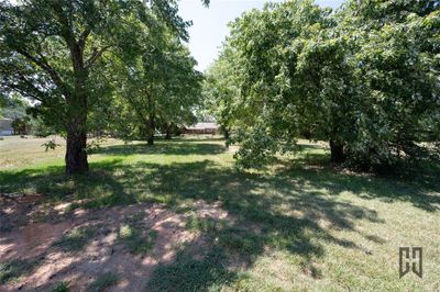 Backyard features tons of shade | Image 3