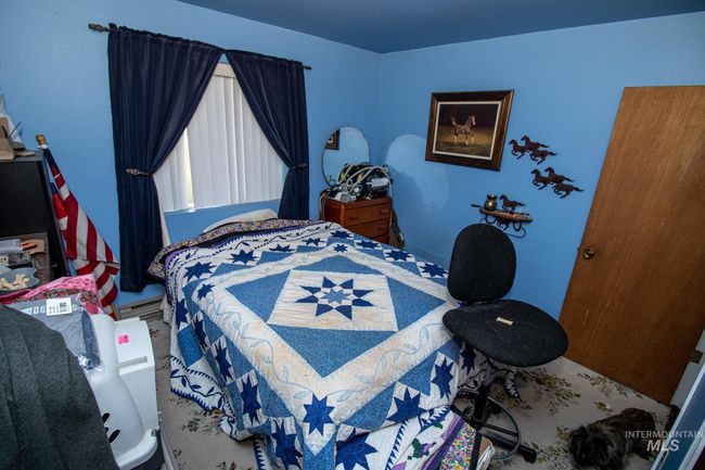 Bedroom with carpet | Image 26