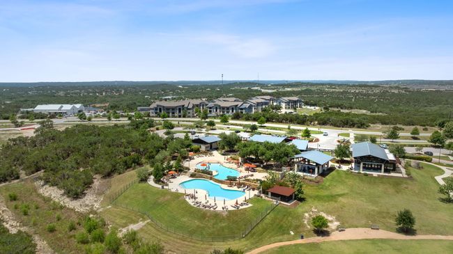 Headwaters residents enjoy access to resort-style amenities: a pool, fitness center, outdoor lounge, dog park, playground, café, trails, and exciting social events. | Image 39