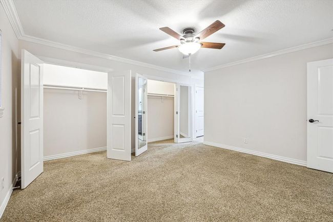 Primary bedroom has two hanging closets plus additional shelving closet.Other bedrooms have abundant closets | Image 15