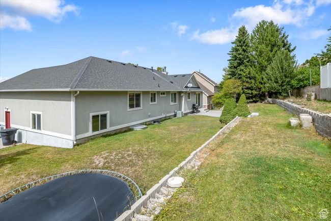 Back of property featuring a yard | Image 43