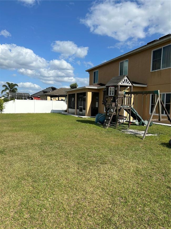 5406 Crepe Myrtle Cir, House other with 4 bedrooms, 3 bathrooms and null parking in KISSIMMEE FL | Image 4