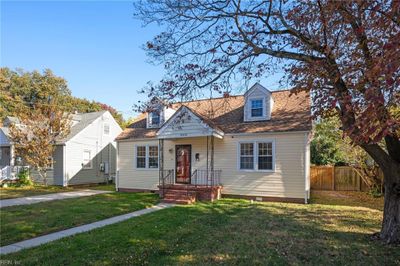 Just 5 blocks to the Chesapeake Bay! Home's driveway fits 2 cars easily. Backyard is fenced. | Image 2