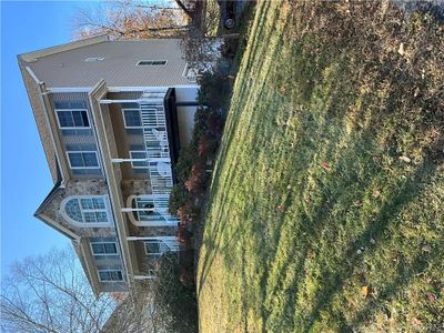 View of front of property with a porch and a front lawn | Image 2