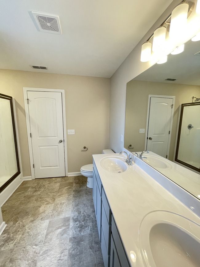 Primary bathroom with double sinks | Image 12