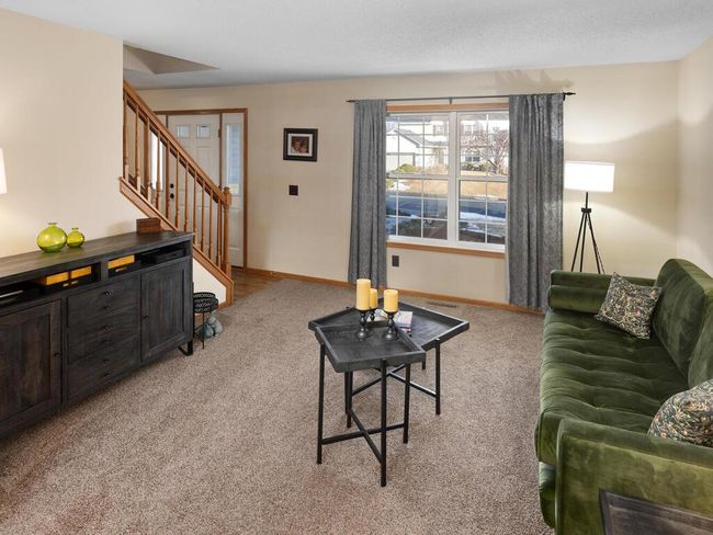 Living room looking to the front of the home | Image 12