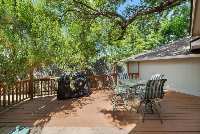Deck featuring outdoor dining space and fence | Image 33