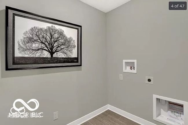 clothes washing area with hookup for an electric dryer, baseboards, hookup for a washing machine, dark wood finished floors, and laundry area | Image 19
