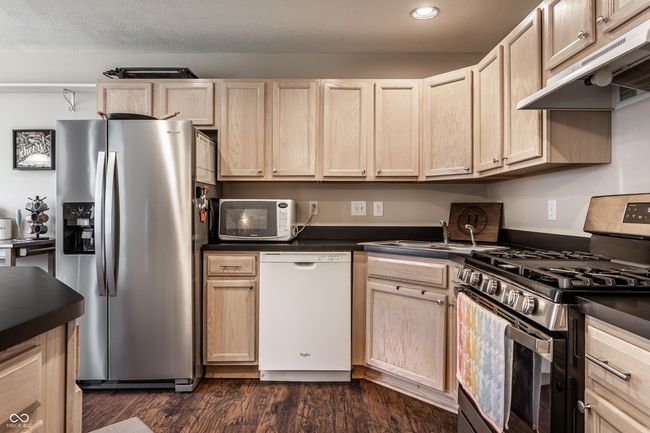 Another view of the kitchen. | Image 11