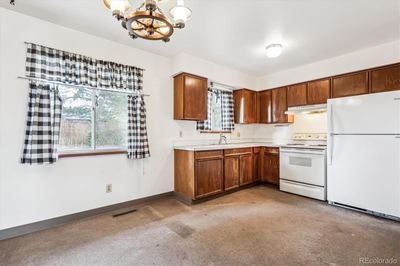 6053 S Cody Way, House other with 3 bedrooms, 1 bathrooms and 1 parking in Littleton CO | Image 3