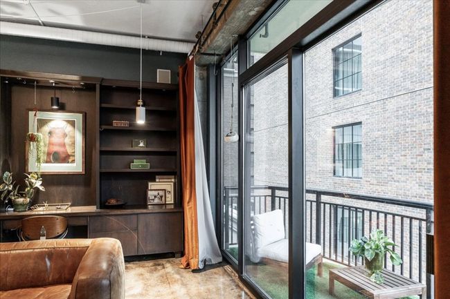 Office with concrete flooring and built in features | Image 12