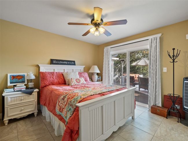 Bedroom 3 overlooks the back patio. | Image 34