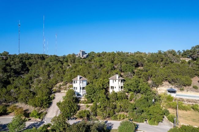 Birds eye view of property with a forest view | Image 39