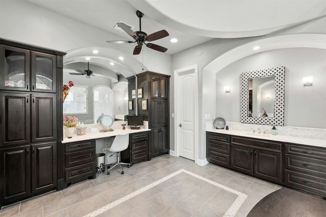Primary bathroom has a large, true walk-in shower, no threshold with 3 shower heads and grab bars which are easily removed. | Image 23