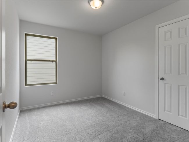Cozy upstairs bedroom with plush carpeting. | Image 11