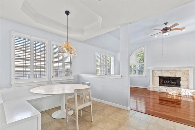 This layout is ideal for hosting get-togethers, with the breakfast nook conveniently situated next to the kitchen and family room. | Image 16