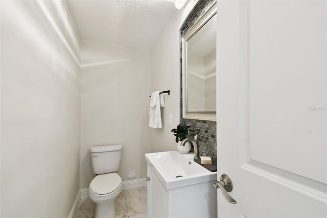 Half bath located on 1st floor | Image 17