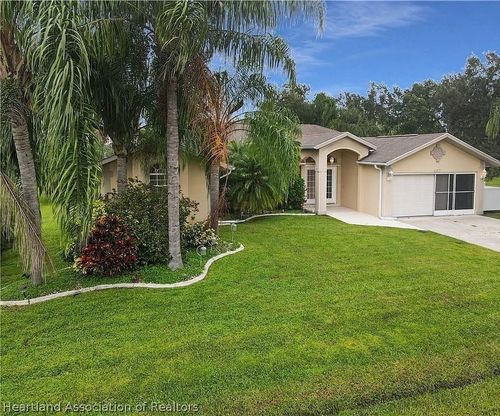 407 Cartagena St, PUNTA GORDA, FL, 33983-5869 | Card Image