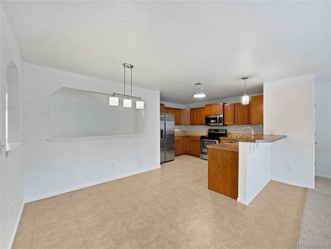 UNIT-307 - 10818 Cimarron St, House attached with 2 bedrooms, 2 bathrooms and null parking in Firestone CO | Image 18