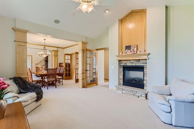 The Living Room. Or Sitting Room. Or Library. Use it how you wish and it includes a 2-sided gas fireplace! | Image 8
