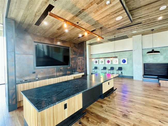 Game room featuring wooden ceiling and wood finished floors | Image 24
