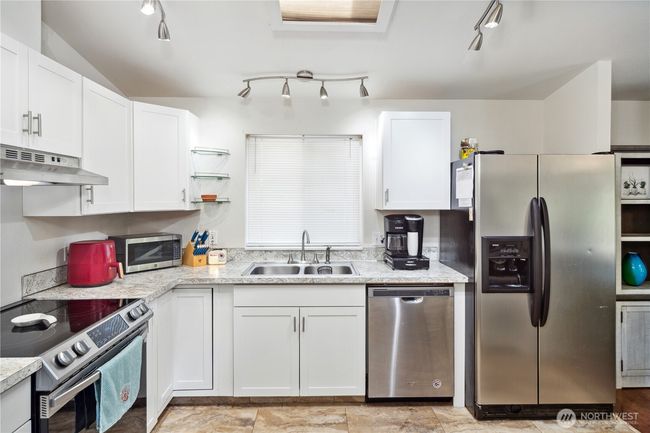 Nice white shaker style cabinetries. | Image 9
