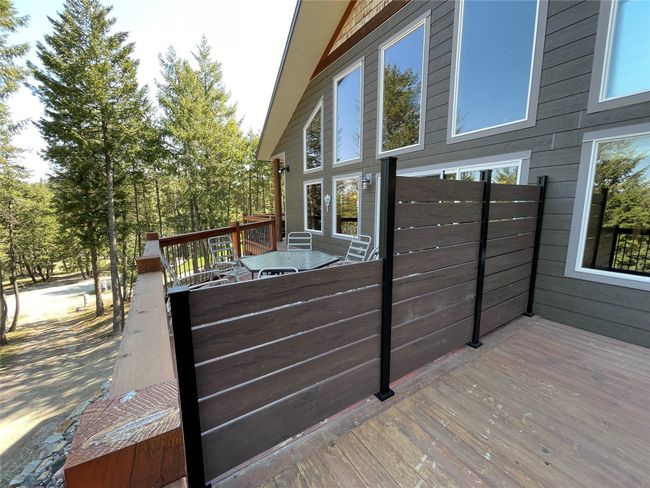 Privacy wall on the deck separating the two units. Lake views! | Image 8