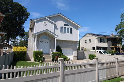 242 W Centennial Ave, Roosevelt, NY, 11575-1924 | Card Image