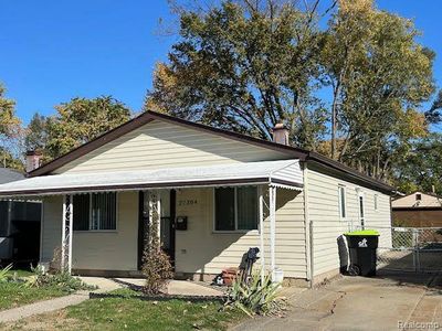 covered front porch w/great view of park | Image 1