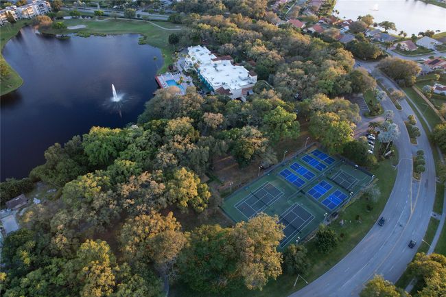 Drone Picture Of Clubhouse And Tennis Courts and Pickle Ball And Basketball Courts | Image 44
