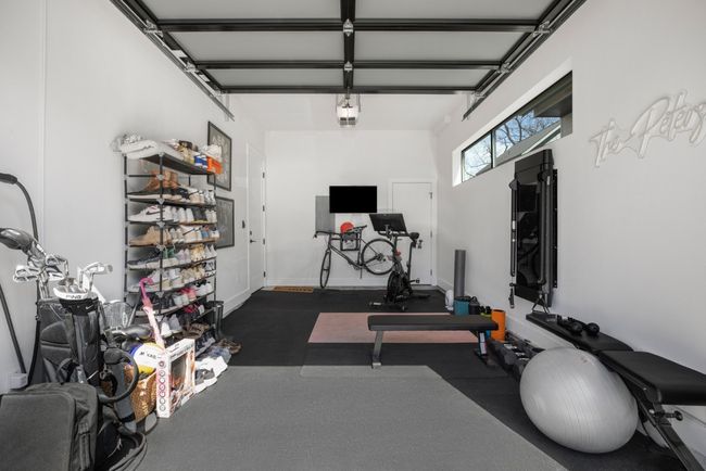 One-car garage, complete with top-of-the-line home gym equipment | Image 32