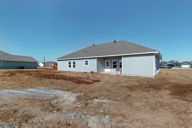 Rear view of property with roof with shingles | Image 36
