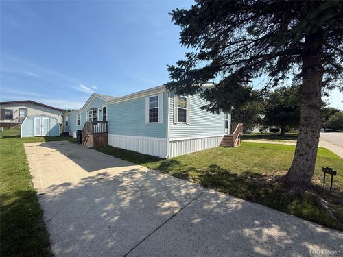 7023 Scarborough Ln, Whitmore Lake, MI, 48189-9094 | Card Image