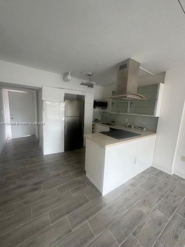 APT-109 - 1650 Ne 115 Th St, Condo with 1 bedrooms, 2 bathrooms and null parking in Miami FL | Image 4