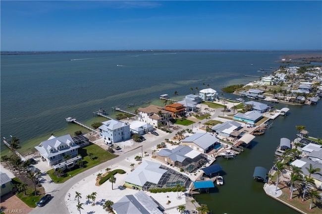 Bird's eye view featuring a water view and a residential view- quick access to the bay right up the canal and quick left. | Image 30