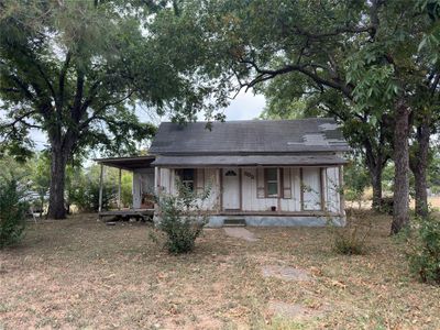 Rear view of property with covered porch | Image 1