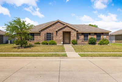 View of front of property with a front yard | Image 1