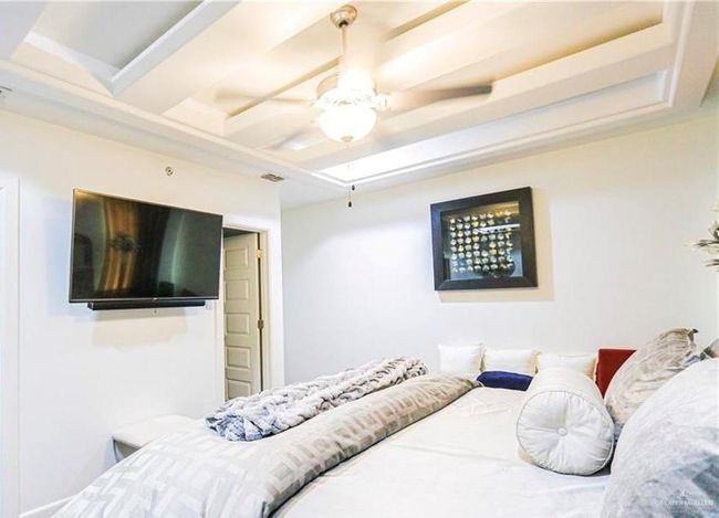 Bedroom featuring ceiling fan | Image 10