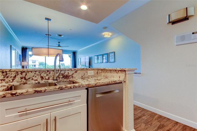 Kitchen with Stone Countertops, Stainless Steel Applicances | Image 23