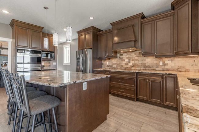 409 Arbourwood Terr S, House other with 10 bedrooms, 6 bathrooms and 8 parking in Lethbridge AB | Image 8