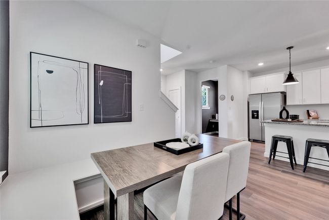 Dining room with recessed lighting and light wood-style floors | Image 14