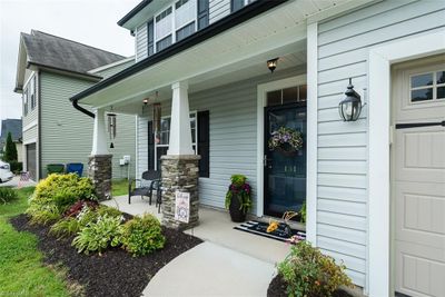 Covered front porch-Sit, Sip & Relax! | Image 3