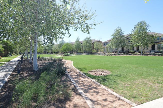View of community with a yard | Image 29