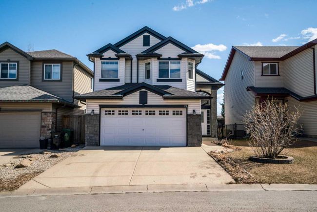 21 Everhollow Rise Sw, Home with 4 bedrooms, 3 bathrooms and 2 parking in Calgary AB | Image 1
