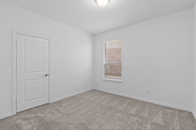 Empty room with carpet flooring and baseboards | Image 17