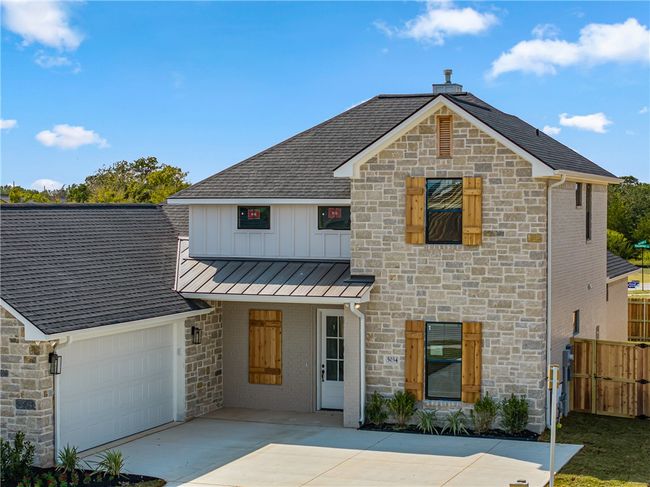 View of front of home with a garage | Image 47