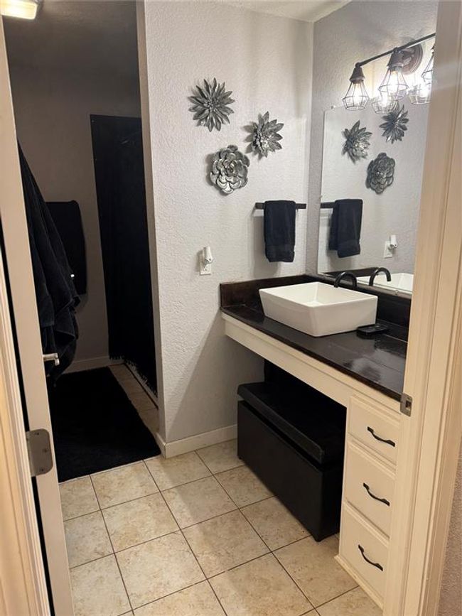 Bathroom featuring tile patterned floors and vanity | Image 9
