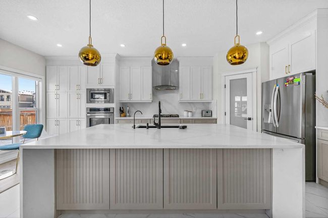 316 Kinniburgh Link, House other with 5 bedrooms, 4 bathrooms and 6 parking in Chestermere AB | Image 14