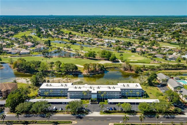 Aerial view with a water view and golf course view | Image 37